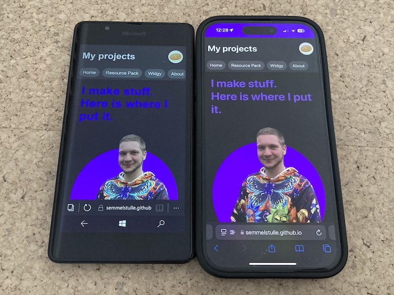 A picture of this very website on an old Windows Phone and a new iPhone